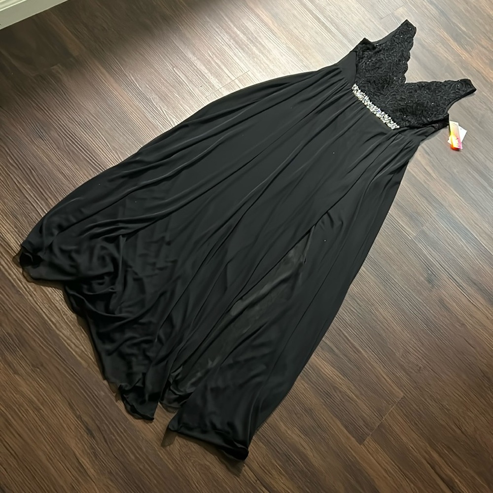 New with tags elegant black BCX evening or prom dress.